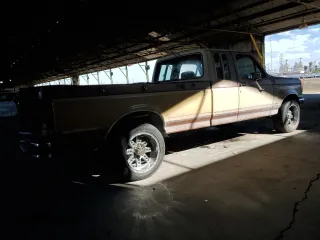 1987 Ford F-250 with VIN 1FTHX2517HKB35293, listed as a Copart auction lot 79138584 with 58,682 mi miles and Clean Title. Bid and sale history available at carsss.com. Image 3.