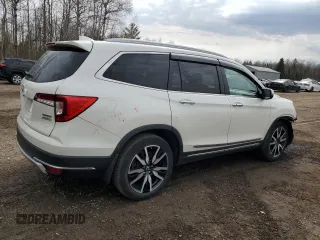 2019 Honda Pilot Touring 7-Passenger with VIN 5FNYF6H64KB503239, listed as a Copart auction lot 52936035 with 83,619 mi miles and Salvage Title. Bid and sale history available at DreamBid. Image 3.