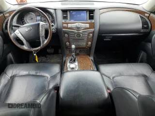 2016 Infiniti QX80 with VIN JN8AZ2NCXG9401865, listed as a Copart auction lot 70574004 with 111,335 mi miles and Salvage Title. Bid and sale history available at DreamBid. Image 8.
