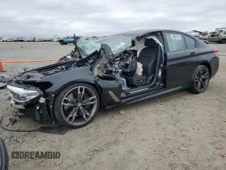 2019 BMW 5 Series M550i xDrive z VIN WBAJB9C53KB464298, wystawiony jako Copart lot #59892105 z przebiegiem Nie podano mil oraz Szkoda całkowita • Salvage title. Historia ofert i sprzedaży dostępna na DreamBid. Obrazek 1.