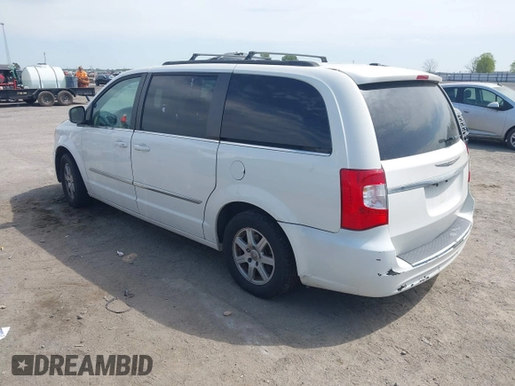 2012 Chrysler Town & Country Touring L with VIN 2C4RC1CG7CR156415, listed as a IAAI auction lot 42045371 with 233,306 mi miles and . Bid and sale history available at carsss.com. Image 3.