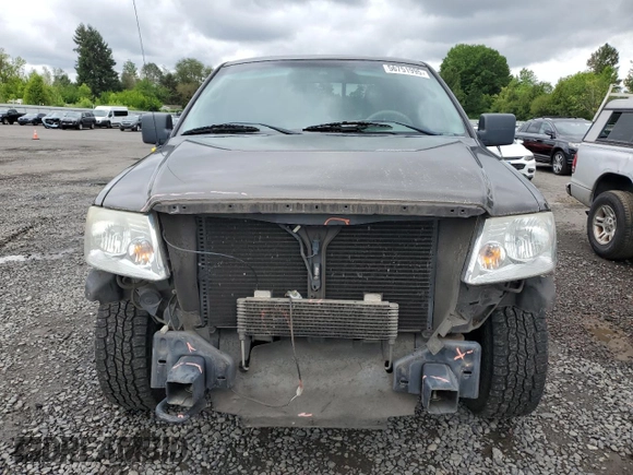 2005 Ford F-150 XLT with VIN 1FTPX14515FB59362, listed as a Copart auction lot 56751995 with 164,390 mi miles and Salvage title. Bid and sale history available at DreamBid. Image 5.