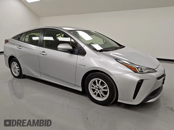 2021 Toyota Prius L Eco z VIN JTDKAMFU0M3140335, wystawiony jako Copart lot #61955845 z przebiegiem 96 071 mil mil oraz Czysty tytuł • Clean title. Historia ofert i sprzedaży dostępna na DreamBid. Obrazek 4.