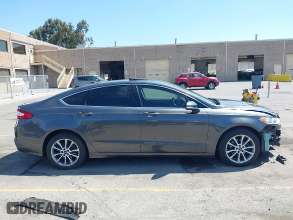 2015 Ford Fusion SE with VIN 3FA6P0HD4FR238607, listed as a IAAI auction lot 42685572 with 132,843 mi miles and . Bid and sale history available at DreamBid. Image 14.