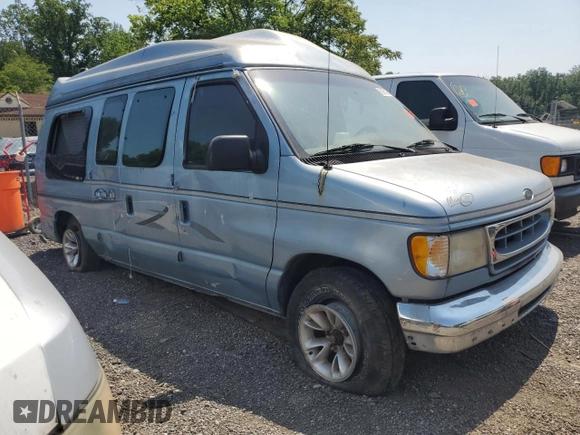 2000 Ford Econoline Cargo Recreational with VIN 1FDRE14L5YHA56690, listed as a Copart auction lot 58926155 with 162,797 mi miles and Salvage title. Bid and sale history available at DreamBid. Image 4.