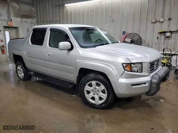 2007 Honda Ridgeline RTS with VIN 2HJYK16497H546990, listed as a Copart auction lot 43242945 with 107,038 mi miles and Salvage Title. Bid and sale history available at carsss.com. Image 4.