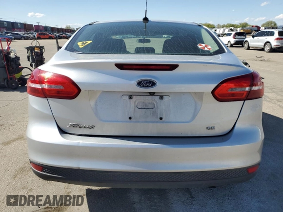 2018 Ford Focus SE z VIN 1FADP3F29JL206110, wystawiony jako Copart lot #53953515 z przebiegiem 80 841 mil mil oraz Szkoda całkowita • Salvage title. Historia ofert i sprzedaży dostępna na DreamBid. Obrazek 6.