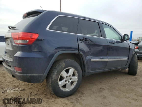 2013 Jeep Grand Cherokee Laredo with VIN 1C4RJEAG1DC584166, listed as a Copart auction lot 52785975 with 210,961 mi miles and Clean Title. Bid and sale history available at carsss.com. Image 3.