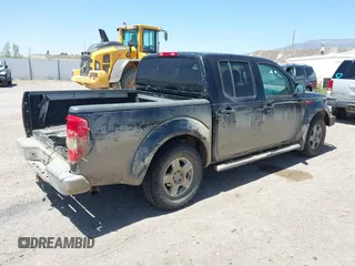 2007 Nissan Frontier Nismo with VIN 1N6AD07W87C437723, listed as a IAAI auction lot 42255788 with 223,177 mi miles and . Bid and sale history available at DreamBid. Image 4.