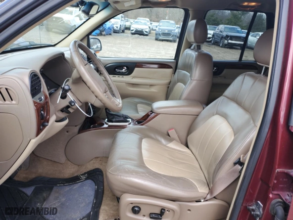 2004 GMC Envoy SLE with VIN 1GKDS13S742231927, listed as a Copart auction lot 47869055 with 79,048 mi miles and Salvage Title. Bid and sale history available at carsss.com. Image 7.