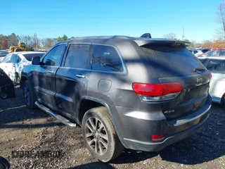 2018 Jeep Grand Cherokee Limited with VIN 1C4RJFBG6JC246293, listed as a IAAI auction lot 40846527 with 114,544 mi miles and . Bid and sale history available at DreamBid. Image 14.