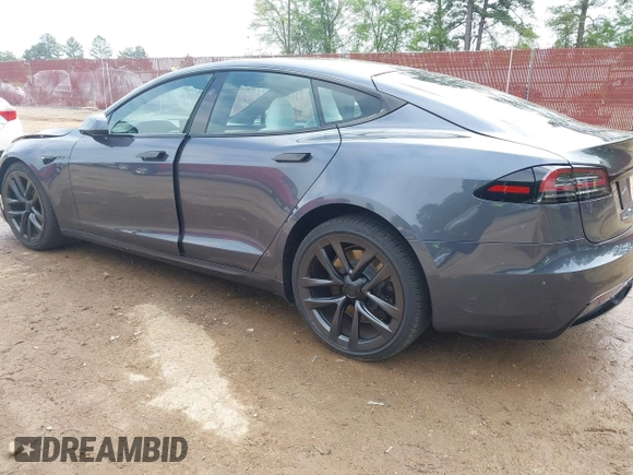 2023 Tesla Model S with VIN 5YJSA1E53PF511231, listed as a IAAI auction lot 41924626 with Not provided miles and . Bid and sale history available at DreamBid. Image 3.