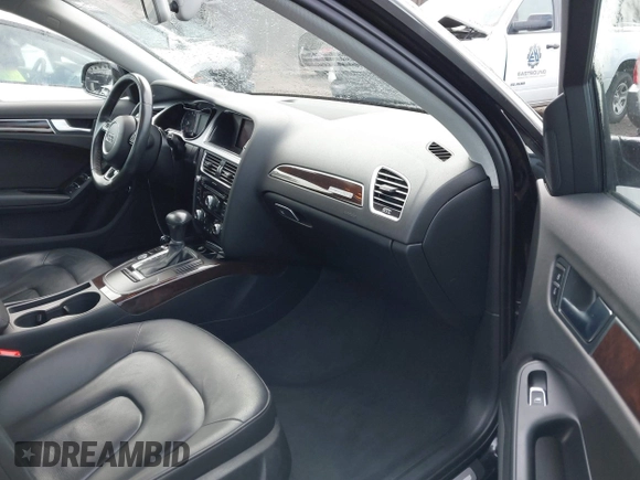 2016 Audi A4 Premium with VIN WAUBFAFL0GN009001, listed as a IAAI auction lot 41282468 with 91,465 mi miles. Bid and sale history available at carsss.com. Image 5.