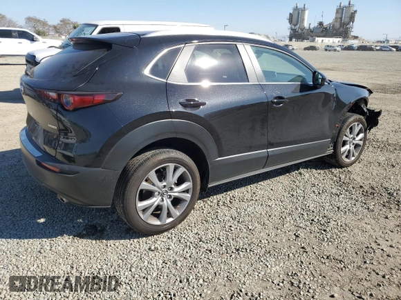 2023 Mazda CX-30 S Carbon Edition with VIN 3MVDMBCM8PM567157, listed as a Copart auction lot 46954865 with 20,038 mi miles and Salvage Title. Bid and sale history available at DreamBid. Image 3.