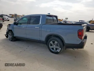 2023 Honda Ridgeline RTL-E with VIN 5FPYK3F76PB036572, listed as a Copart auction lot 54717085 with 34,516 mi miles and Salvage title. Bid and sale history available at DreamBid. Image 2.