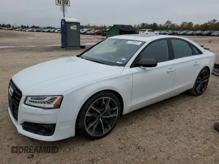 2017 Audi S8 z VIN WUAJ5AFD8HN901401, wystawiony jako Copart lot #77734973 z przebiegiem 133 780 mil mil oraz . Historia ofert i sprzedaży dostępna na DreamBid. Obrazek 1.