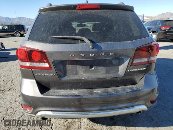 2015 Dodge Journey Crossroad z VIN 3C4PDCGG1FT592379, wystawiony jako Copart lot #50569815 z przebiegiem 108 382 mil mil oraz Szkoda całkowita • Salvage title. Historia ofert i sprzedaży dostępna na DreamBid. Obrazek 6.