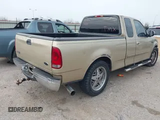 2000 Ford F-150 XL with VIN 1FTZX1725YKB41680, listed as a IAAI auction lot 41736655 with 1 mi miles. Bid and sale history available at carsss.com. Image 4.