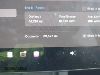 2023 Tesla Model Y Long Range z VIN 7SAYGAEE5PF603128, wystawiony jako IAAI lot #41328797 z przebiegiem 63 527 mil mil oraz . Historia ofert i sprzedaży dostępna na DreamBid. Obrazek 15.