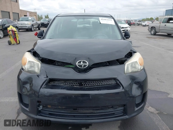 2009 Scion xD with VIN JTKKU10469J034191, listed as a IAAI auction lot 41982622 with 175,743 mi miles. Bid and sale history available at carsss.com. Image 12.