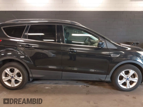 2014 Ford Escape SE with VIN 1FMCU0GX6EUE31877, listed as a IAAI auction lot 42080730 with 71,251 mi miles. Bid and sale history available at carsss.com. Image 13.