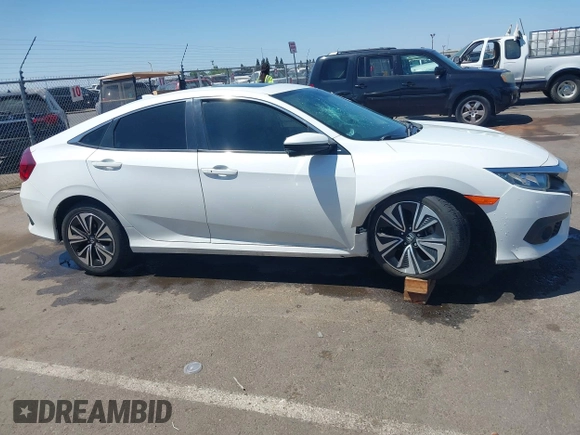 2016 Honda Civic EX-L z VIN 2HGFC1F83GH636374, wystawiony jako IAAI lot #42328432 z przebiegiem 130 738 mil mil oraz . Historia ofert i sprzedaży dostępna na DreamBid. Obrazek 13.