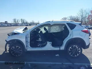 2016 Mazda CX-5 Grand Touring with VIN JM3KE4DY9G0706192, listed as a IAAI auction lot 41824828 with Not Provided miles and . Bid and sale history available at DreamBid. Image 14.