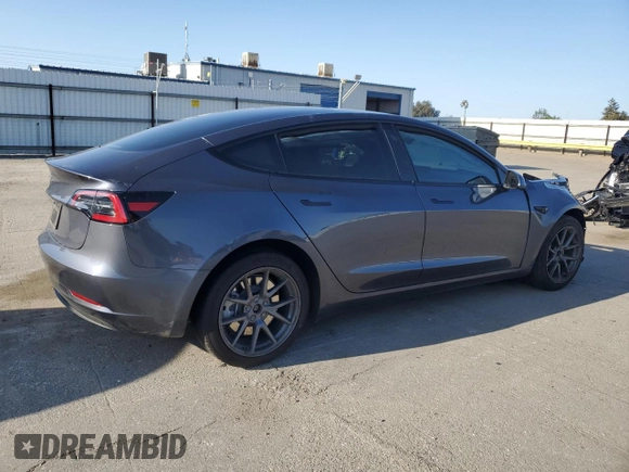 2023 Tesla Model 3 with VIN 5YJ3E1EA9PF714646, listed as a Copart auction lot 51551455 with 29,611 mi miles and Salvage Title. Bid and sale history available at DreamBid. Image 3.