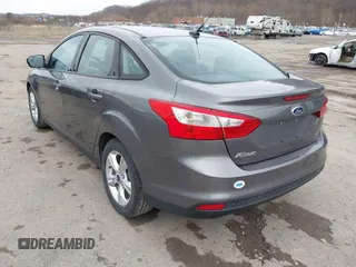 2014 Ford Focus SE with VIN 1FADP3F24EL105899, listed as a IAAI auction lot 41840399 with 90,074 mi miles. Bid and sale history available at carsss.com. Image 3.