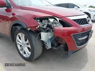 2012 Mazda CX-9 Grand Touring с VIN JM3TB2DA7C0337122, выставлен на аукционе IAAI как лот 42059539 с пробегом 172 011 миль миль и . История ставок и продаж доступна на DreamBid. Изображение 6.