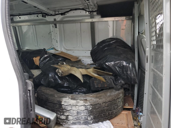 2016 Ford Transit Cargo with VIN 1FTYR1ZM1GKA62977, listed as a Copart auction lot 57054015 with 62,670 mi miles and Salvage title. Bid and sale history available at DreamBid. Image 11.