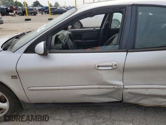 2004 Ford Taurus SES with VIN 1FAFP55S74G119390, listed as a Copart auction lot 60631865 with Not provided miles and Salvage title. Bid and sale history available at DreamBid. Image 7.