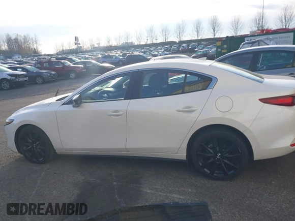 2022 Mazda 3 2.5 Turbo with VIN 3MZBPBAY2NM311824, listed as a IAAI auction lot 41038030 with 21,669 mi miles and . Bid and sale history available at DreamBid. Image 15.