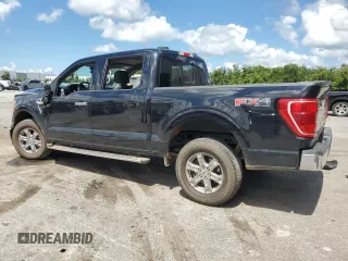 2023 Ford F-150 XL with VIN 1FTFW1E88PFC77984, listed as a Copart auction lot 62222845 with 36,957 mi miles and Salvage title. Bid and sale history available at DreamBid. Image 2.
