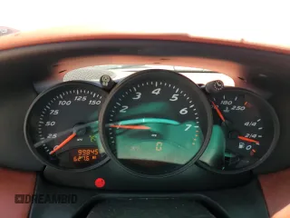 2000 Porsche Boxster с VIN WP0CA2983YU620909, выставлен на аукционе Copart как лот 58087035 с пробегом 99 845 миль миль и Чистый • Clean title. История ставок и продаж доступна на DreamBid. Изображение 9.