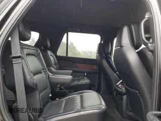 2021 Lincoln Navigator Reserve z VIN 5LMJJ2LT4MEL02895, wystawiony jako Copart lot #55827225 z przebiegiem 73 202 mil mil oraz Szkoda całkowita • Salvage title. Historia ofert i sprzedaży dostępna na DreamBid. Obrazek 11.