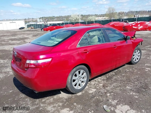 2007 Toyota Camry CE with VIN JTNBE46K573115563, listed as a IAAI auction lot 41971937 with 132,427 mi miles. Bid and sale history available at carsss.com. Image 4.