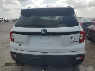 2021 Honda Passport Touring z VIN 5FNYF7H93MB014916, wystawiony jako Copart lot #75050454 z przebiegiem 28 364 mil mil oraz Nie do naprawy • Non repairable. Historia ofert i sprzedaży dostępna na DreamBid. Obrazek 6.