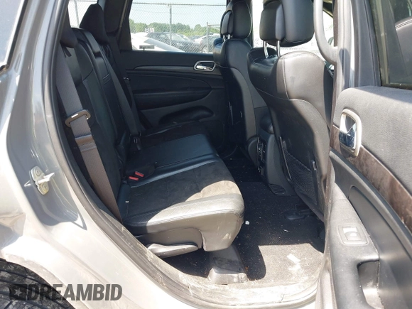 2020 Jeep Grand Cherokee Laredo E with VIN 1C4RJFAG0LC293050, listed as a IAAI auction lot 42566345 with 64,960 mi miles and . Bid and sale history available at DreamBid. Image 8.