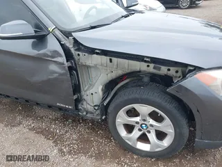 2013 BMW X1 28i with VIN WBAVM1C51DVW42577, listed as a IAAI auction lot 42029627 with 140,343 mi miles. Bid and sale history available at carsss.com. Image 6.