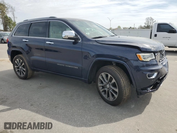 2017 Jeep Grand Cherokee Overland with VIN 1C4RJFCG6HC602413, listed as a Copart auction lot 49641325 with 157,558 mi miles and Salvage Title. Bid and sale history available at carsss.com. Image 4.