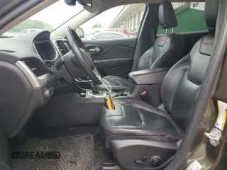 2015 Jeep Cherokee Trailhawk z VIN 1C4PJMBSXFW588030, wystawiony jako Copart lot #55057635 z przebiegiem 116 209 mil mil oraz Szkoda całkowita • Salvage title. Historia ofert i sprzedaży dostępna na DreamBid. Obrazek 7.