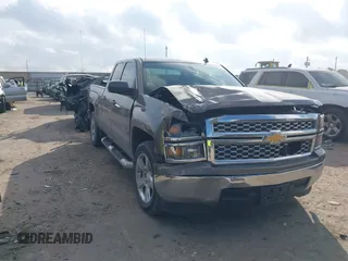 2014 Chevrolet Silverado 1500 LT with VIN 1GCRCREC7EZ397070, listed as a IAAI auction lot 41535953 with 161,419 mi miles and . Bid and sale history available at DreamBid. Image 1.
