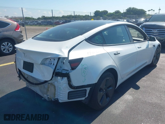 2023 Tesla Model 3 with VIN 5YJ3E1EA0PF548498, listed as a IAAI auction lot 42334326 with 17,674 mi miles and . Bid and sale history available at DreamBid. Image 4.