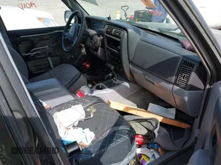 1997 Jeep Cherokee Sport with VIN 1J4FJ68S9VL517300, listed as a IAAI auction lot 42003493 with Not provided miles and . Bid and sale history available at DreamBid. Image 5.
