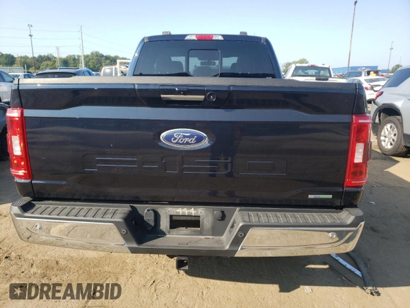 2021 Ford F-150 XL with VIN 1FTFX1E88MKD05444, listed as a Copart auction lot 71669704 with 35,779 mi miles and Salvage title. Bid and sale history available at DreamBid. Image 6.