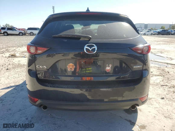 2020 Mazda CX-5 Grand Touring with VIN JM3KFADM7L0780990, listed as a Copart auction lot 48550845 with 85,942 mi miles and Salvage Title. Bid and sale history available at carsss.com. Image 6.
