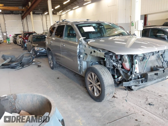 2014 Dodge Durango Limited z VIN 1C4RDJDG1EC976674, wystawiony jako IAAI lot #41745467 z przebiegiem 194 989 mil mil oraz . Historia ofert i sprzedaży dostępna na DreamBid. Obrazek 1.