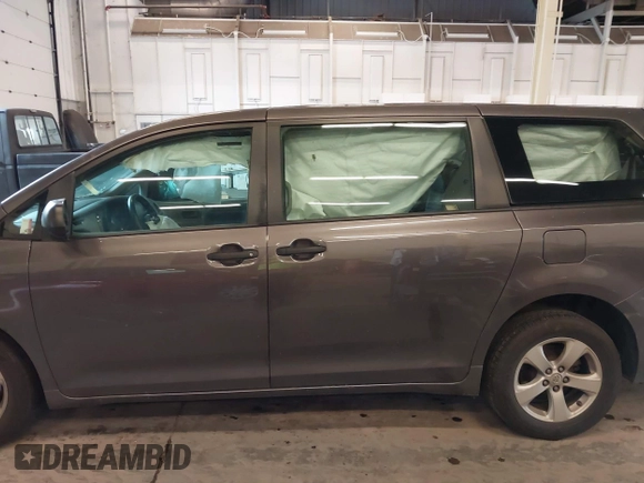 2015 Toyota Sienna L with VIN 5TDZK3DCXFS567507, listed as a IAAI auction lot 41205670 with 104,443 mi miles and . Bid and sale history available at DreamBid. Image 15.
