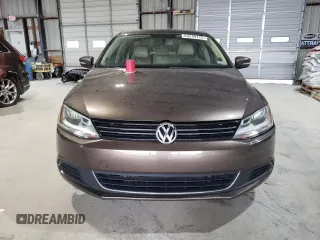 2014 Volkswagen Jetta TDI w/Premium/Nav with VIN 3VWLL7AJ3EM352687, listed as a Copart auction lot 63249725 with 122,678 mi miles and Clean title. Bid and sale history available at DreamBid. Image 5.